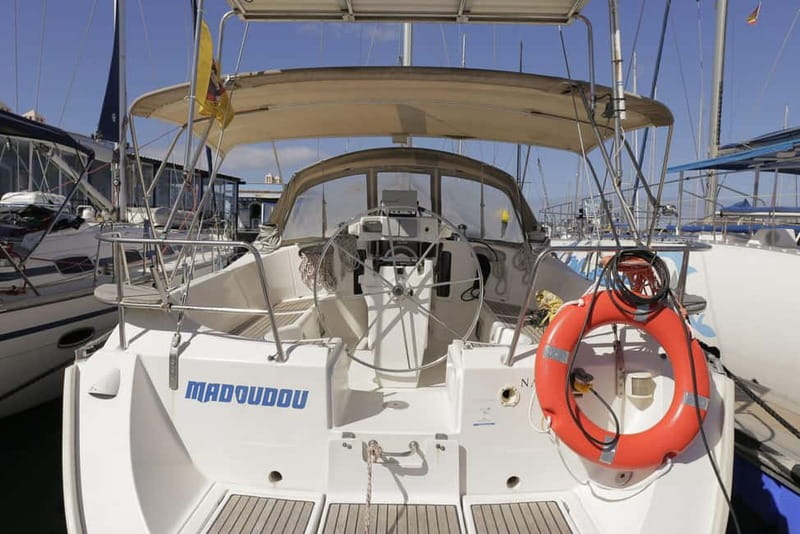 3h Whale Watching Private tour Beneteau Oceanis 440 - Los Cristianos break time, snorkeling gear, and the snack table