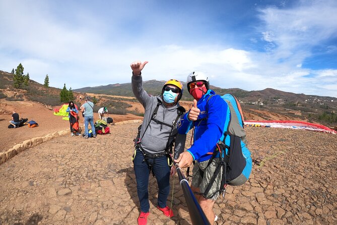 Acrobatic Paragliding Flight with Spanish Champion in Tenerife - Photos: you get 5 gift photos, with optional add-ons
