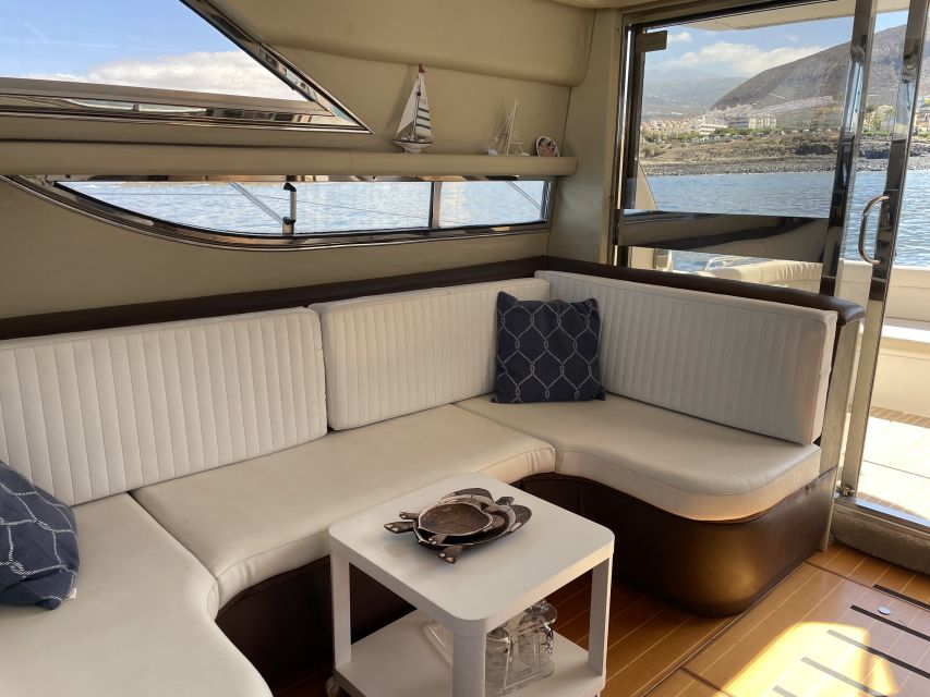 Las Galletas: Private Luxury Yacht Cruise with Lunch - Los Cristianos cliffs and cave cruising: the scenery you don’t get from shore