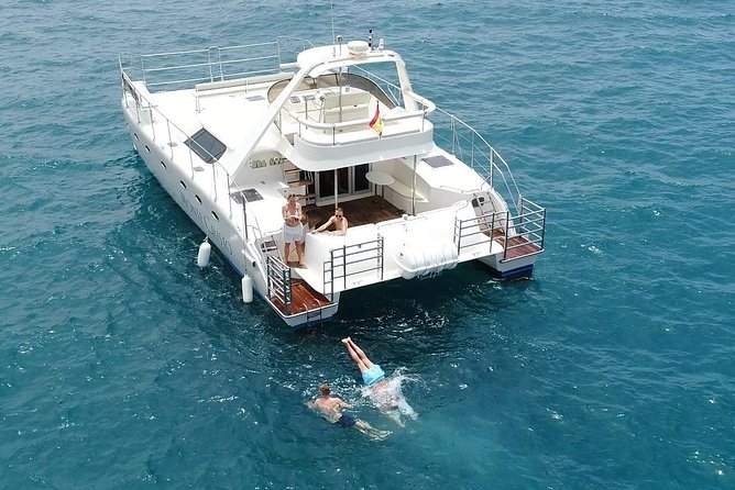 Private Catamaran Charter with Transfer, Buffet and Snorkeling - Onboard setup that keeps the day feeling relaxed