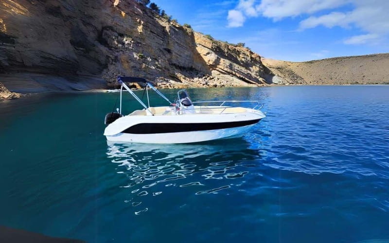 Puerto Colon: License-Free Self-Drive Boat in Tenerife - Onboard Comfort: Canopy Shade, Fridge Cold Drinks, and Music