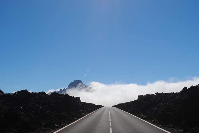 TEIDE NIGHT Astronomy Stargazing Bus Tour, Meal & Drinks included! - Sunset above the clouds at Volcán El Teide