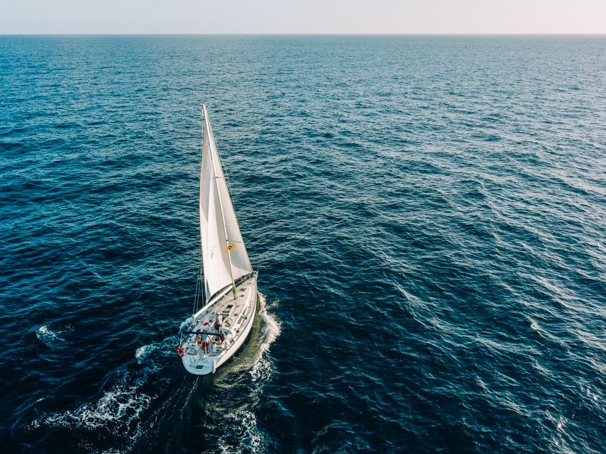 Tenerife: Sailboat Tour with Food and Snorkeling - Costa Adeje from the water on the Roulette