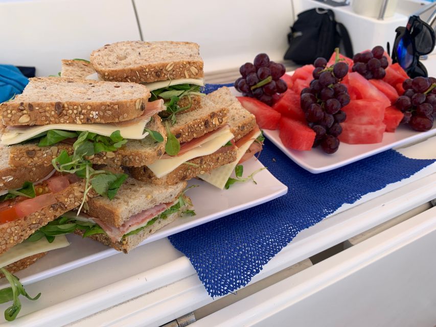 Tenerife: Sailing Excursion with Whale and Dolphin Watching - Onboard Comfort, Snacks, and the Crew Style